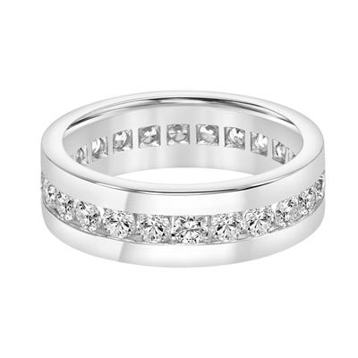 A white-gold ring is displayed in the middle of a white background. The ring features a row of brilliant diamonds.