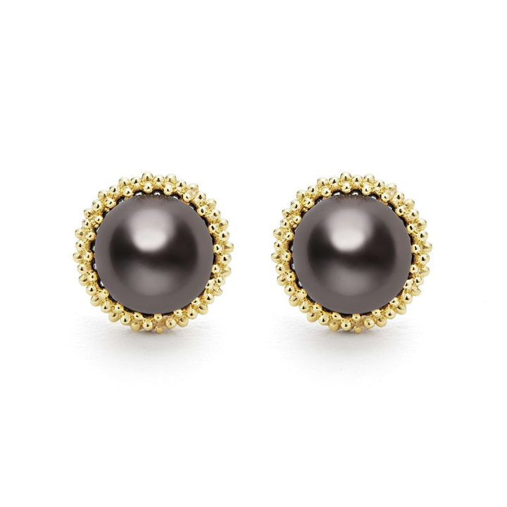 Tahitian black pearl stud earrings set in 18K gold Caviar beading.