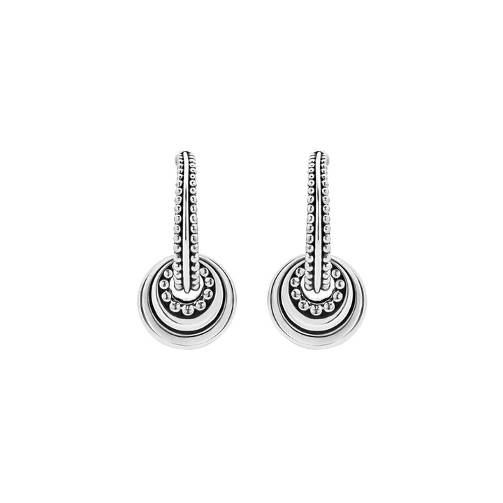 A pair of hoop earrings with a sterling silver fluted hanging charm and caviar beading. The right earring is angled to the side.