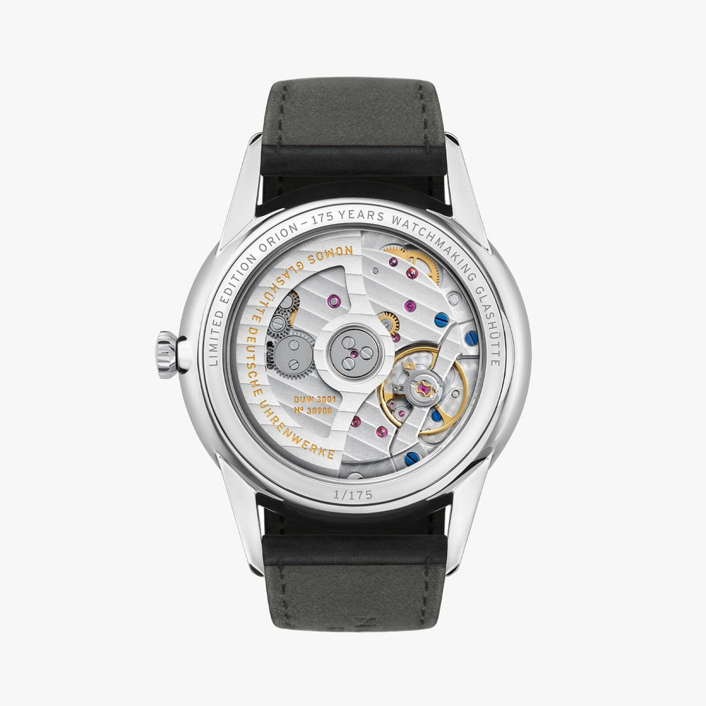 The back of a Nomos Glashutte watch showcases the back of the dial, stainless steel bezel, and strap.