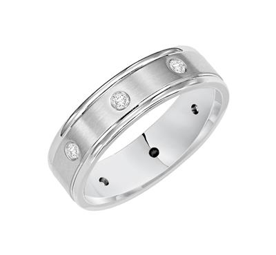 An angled view of a white gold wedding band against a white background. The ring features 8 set diamonds, a brushed finish, and round edges.