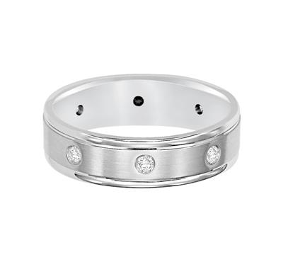 A front view of a white gold wedding band against a white background. The ring features 8 set diamonds, a brushed finish, and round edges.