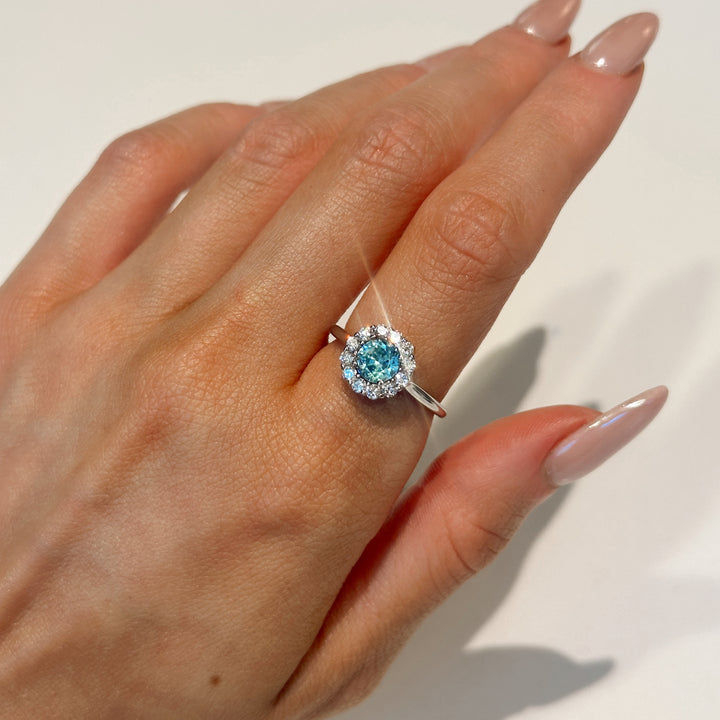 Blue Zircon and Diamond Halo Ring