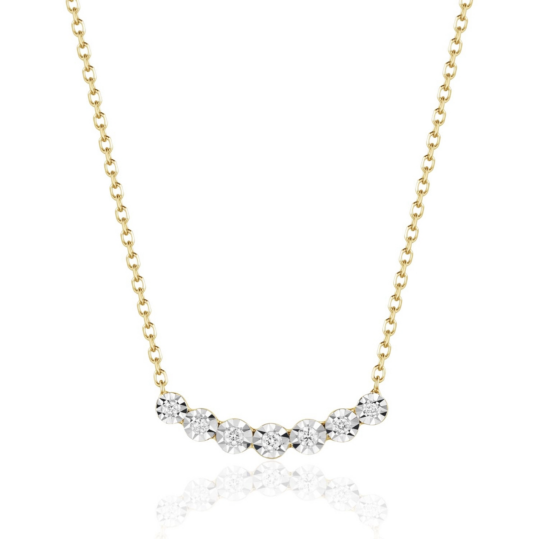 A close-up of a yellow-gold Cosmic Crescent Diamond Necklace against a white background. The necklace features a celestial-inspired pendant set with diamonds.