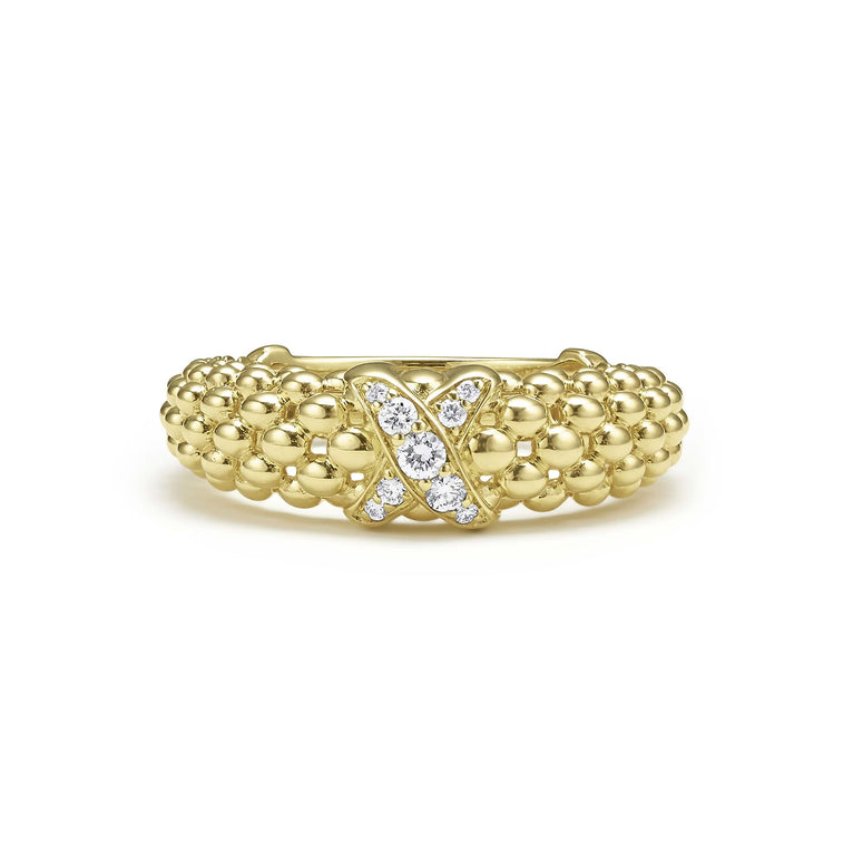 A 18K gold diamond-set x-motif ring with caviar beading