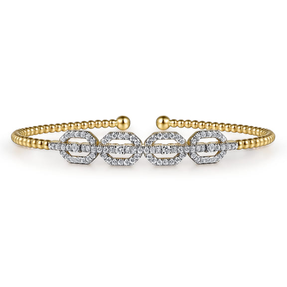 Gabriel & Co Bujukan yellow gold bangle with diamond-accented interlocking links and a polished beaded band.