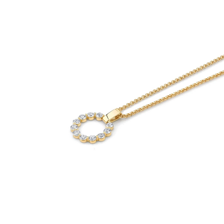 Angled view of the Large Cloud Pendant showing shared-prong diamond settings, a gold bar bail and cable chain