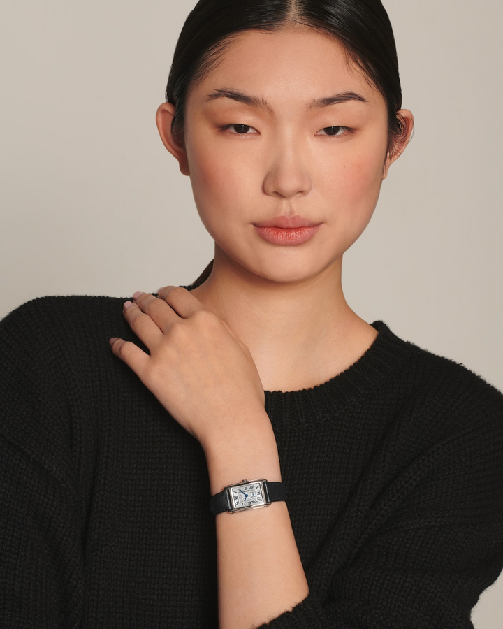 LONGINES DolceVita L5.255.4.71.0 Silver Dial Watch Worn on Wrist With Black Sweater