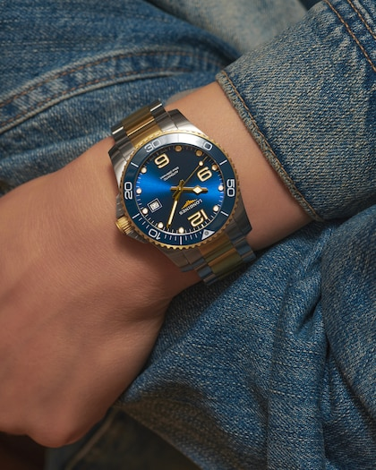 LONGINES HydroConquest Blue Dial Two-Tone Watch Worn on Wrist With Denim