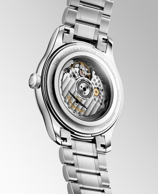 Rear view of the LONGINES Master Collection L2.950.4.79.6 showing its transparent caseback and stainless steel bracelet.