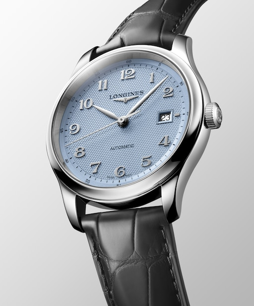 Angled view of the LONGINES Master Collection L2.950.4.99.2 with a light blue dial, steel case and leather strap.