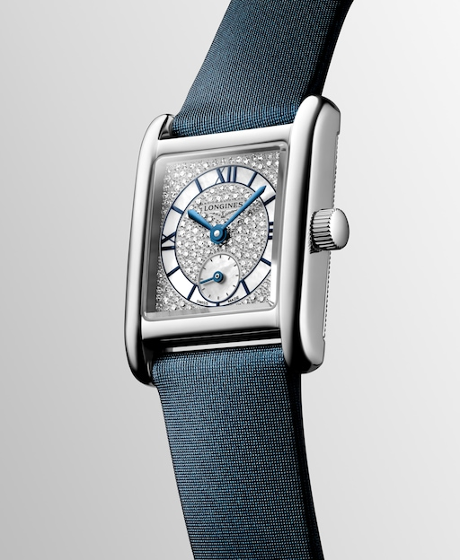 Angled view of the LONGINES Mini DolceVita L5.200.4.87.2 showing its diamond dial, rectangular case and blue strap.
