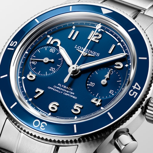 Close-up of the LONGINES Spirit Pilot Flyback L3.721.4.93.6 blue dial with Arabic numerals and chronograph subdials.