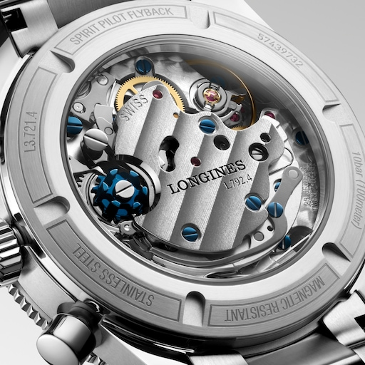 Close-up of the LONGINES Spirit Pilot Flyback L3.721.4.93.6 manual-winding movement through its sapphire caseback.