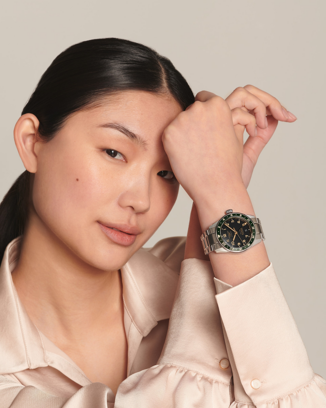 LONGINES Spirit Zulu Time L3.802.4.63.6 GMT Watch Worn on Wrist With Satin Blouse