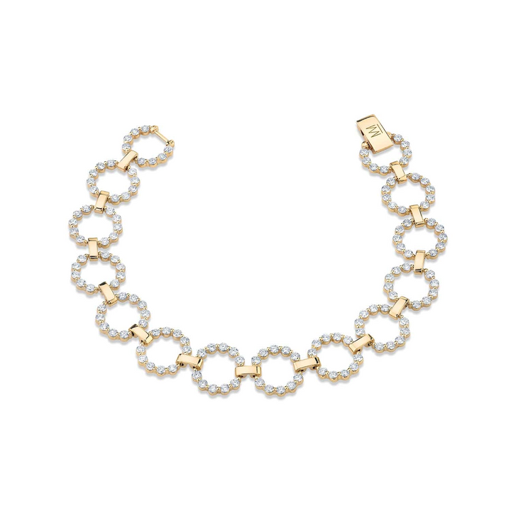 Angled view of the MICHAEL M Cloud Infinity Bracelet with flowing white-metal links bordered by round diamonds.