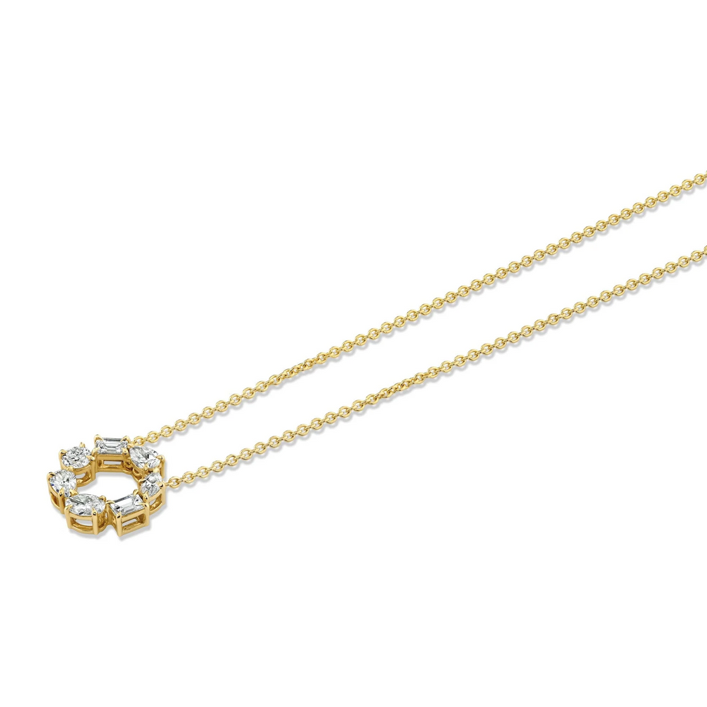 An angled view of a yellow gold pendant necklace laid out against a white background. The ring features two pear-cut diamonds, two emerald-cut diamonds, one marquise-cut diamond, one round-cut diamond, and one oval-cut diamond custer design pendant.