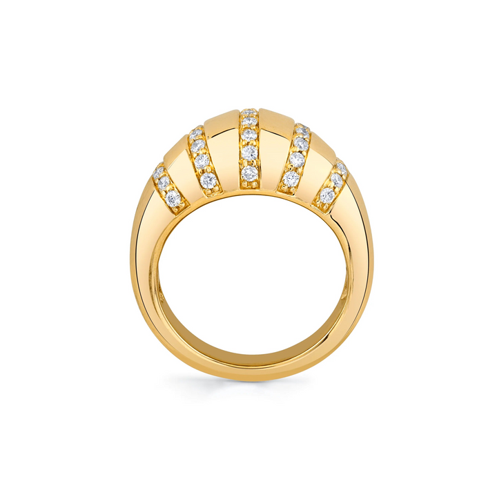 A side view of a yellow gold diamond ring against a white background. The ring features diamond-set rows of tiny pavé diamonds that line the softly rounded golden surface of the domed signet ring.