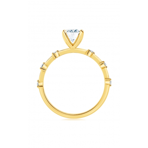 Profile view of a yellow gold oval solitaire engagement ring showing the open V-shaped center setting and individual diamond accents along the band.