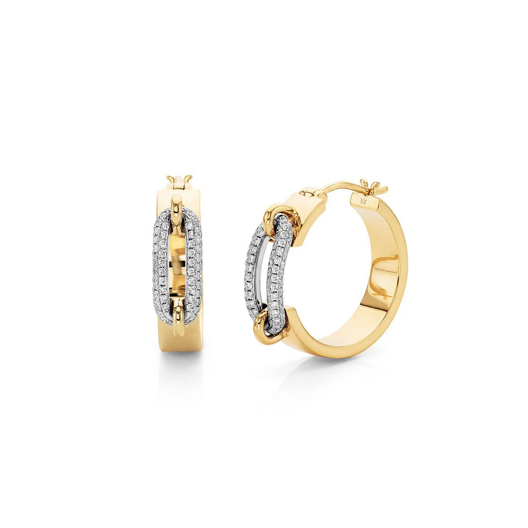 An angled view of yellow gold earrings against a white background. The earrings feature a wide base with an interlocking center pave link with a hinge post at the top.