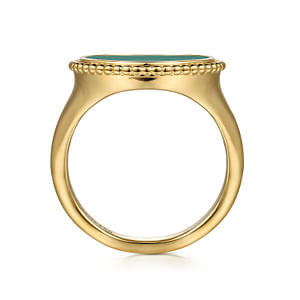 A top view of a yellow gold ring against a white background. The ring features an inlay of vibrant green malachite gemstone and yellow gold Bujukan beading.