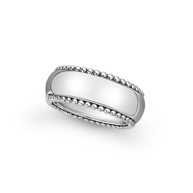 An angled view of a white gold wedding band against a white background. The ring features smooth sterling silver and caviar beading around the edges.