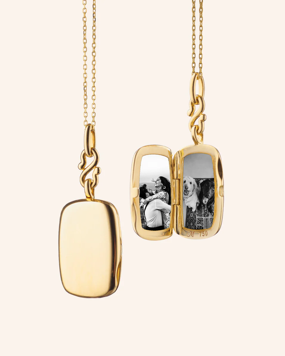 Slim Britt 18K yellow gold locket necklace shown closed and open with two photos insid