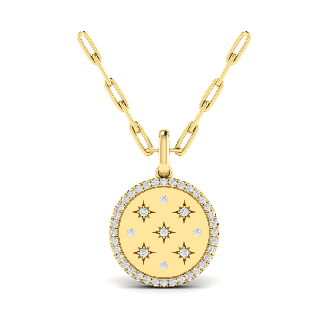 A front view of a yellow gold pendant necklace is set against a white background. The circular pendant necklace features nine round-shaped diamonds, star motifs, a diamond-set halo, and a yellow gold chain.