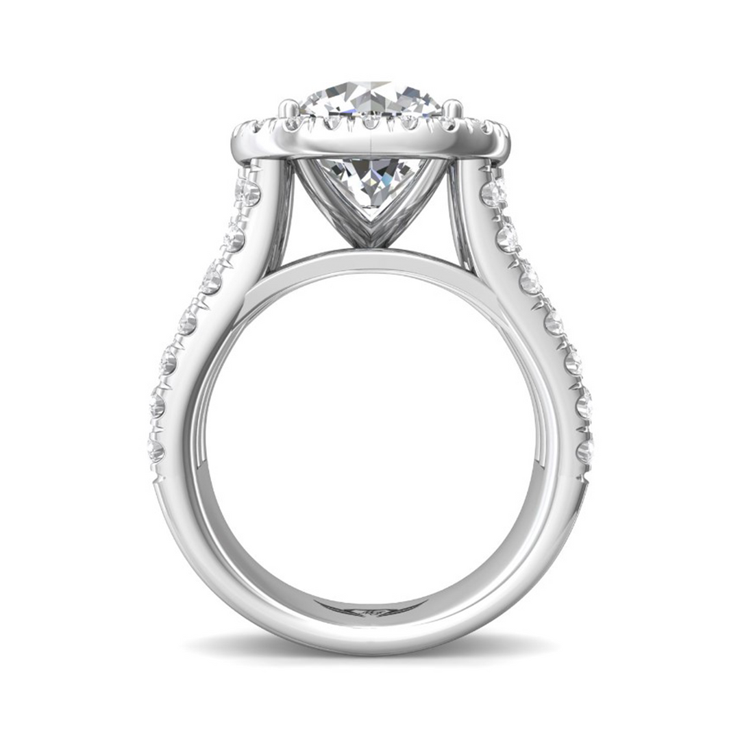 Profile view of a 14K white gold triple split shank engagement ring showing the raised halo, open gallery and diamond-set shoulders.