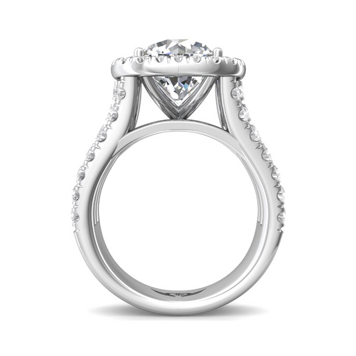 Profile view of a 14K white gold triple split shank engagement ring showing the raised halo, open gallery and diamond-set shoulders.