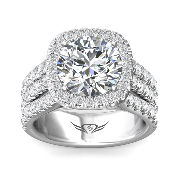 Top view of a round center diamond framed by a cushion-shaped halo with three diamond-set strands on each shoulder.