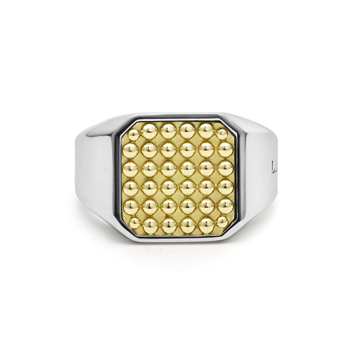 A front view of a yellow gold ring against a white background. The ring features a square gold bead motif in the middle and a thick silver band.
