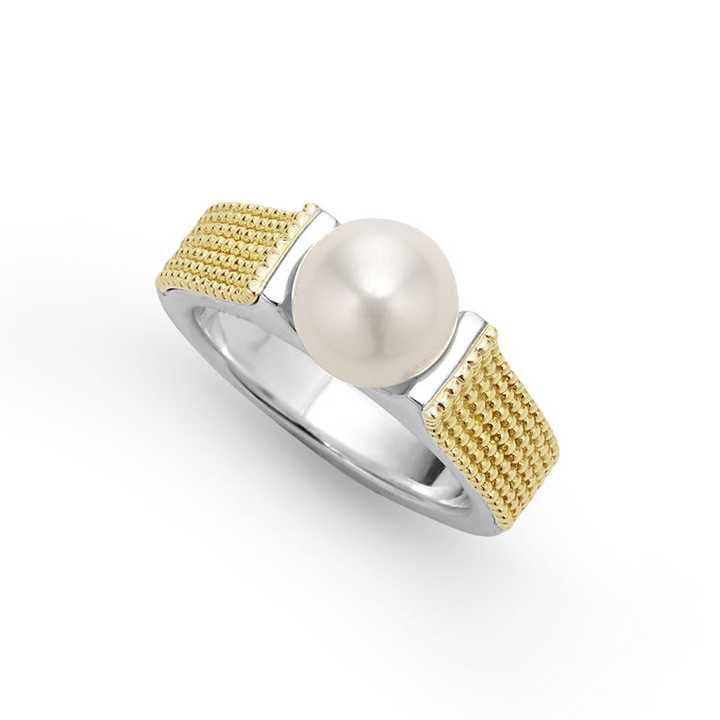 An angled view of a yellow gold ring against a white background. The ring features a two-tone caviar pearl ring with 18K gold beading on the band and a sterling silver form. The pearl measures 8mm in diameter.