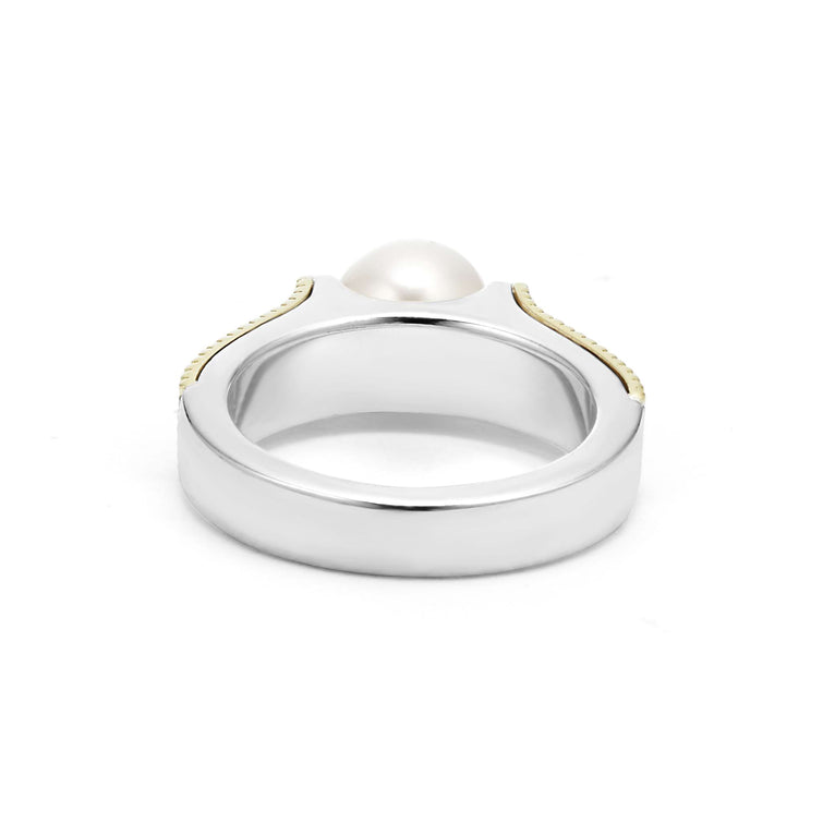 A back view of a yellow gold ring against a white background. The ring features a two-tone caviar pearl ring with 18K gold beading on the band and a sterling silver form. The pearl measures 8mm in diameter.