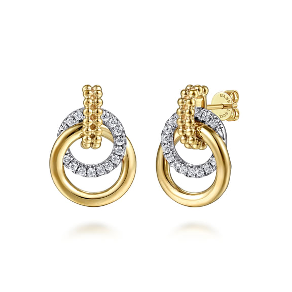 Gabriel & Co Bujukan stud earrings with interlocking beaded yellow gold rings and diamond-set white gold circles.