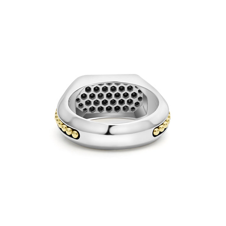 A back view of a sterling silver and 18k yellow gold ring against a white background. The ring features an octagon-shaped center piece with Black diamonds accented by sterling silver and 18K gold Caviar beading.
