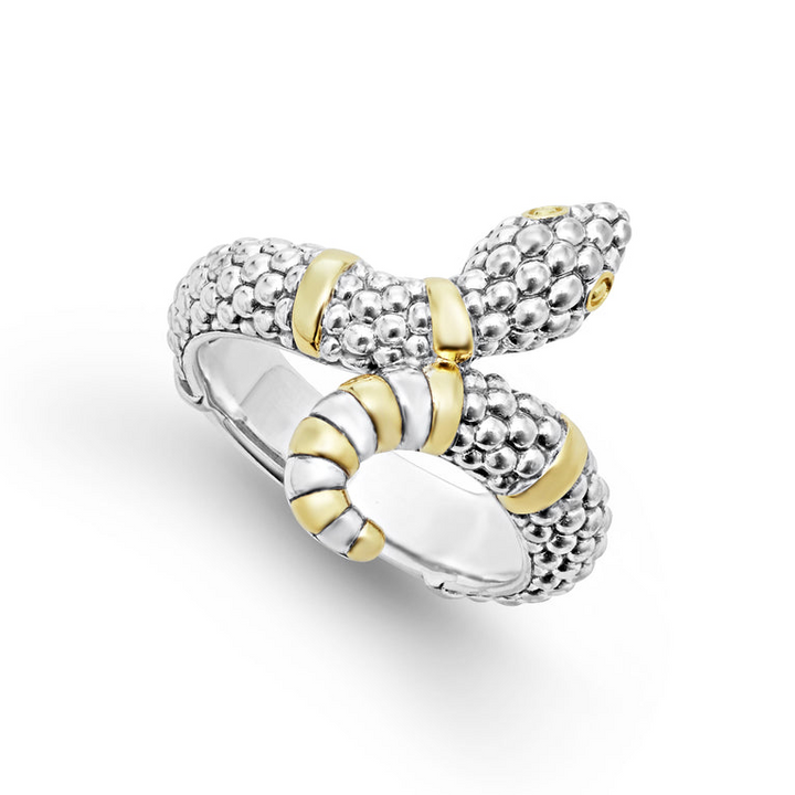 An angled view of a sterling silver and 18k yellow gold ring against a white background. The ring features a snake motif with Sterling silver Caviar beading highlighted by 18K gold stations.