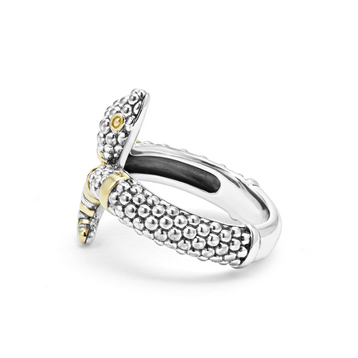 A side view of a sterling silver and 18k yellow gold ring against a white background. The ring features a snake motif with Sterling silver Caviar beading highlighted by 18K gold stations.