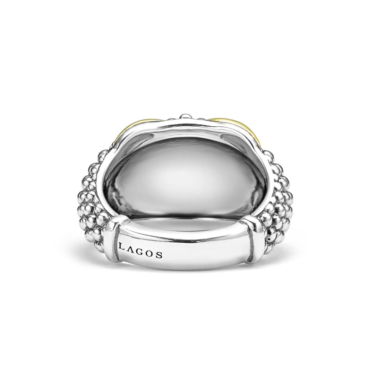 A back view of a sterling silver and 18k yellow gold ring against a white background. The ring features a two-tone dome-shaped ring with 18K gold and sterling silver caviar beading.