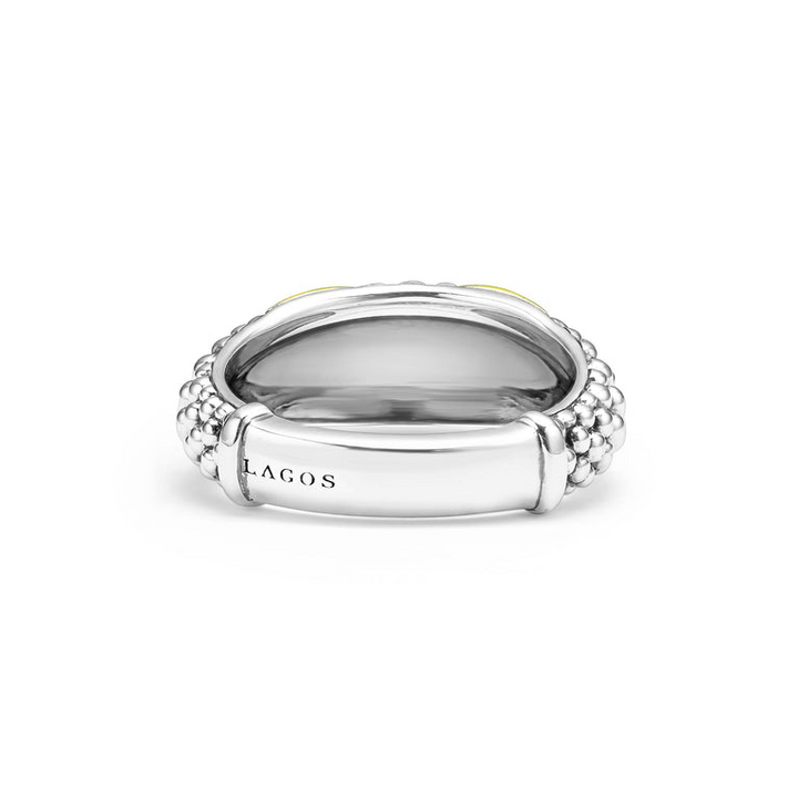 A back view of a sterling silver and 18k yellow gold ring against a white background. The ring features a two-tone ring with 18K gold and sterling silver caviar beading.