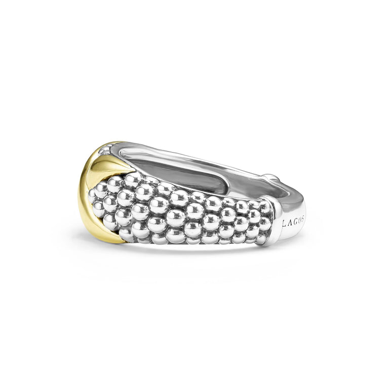 A side view of a sterling silver and 18k yellow gold ring against a white background. The ring features a two-tone ring with 18K gold and sterling silver caviar beading.