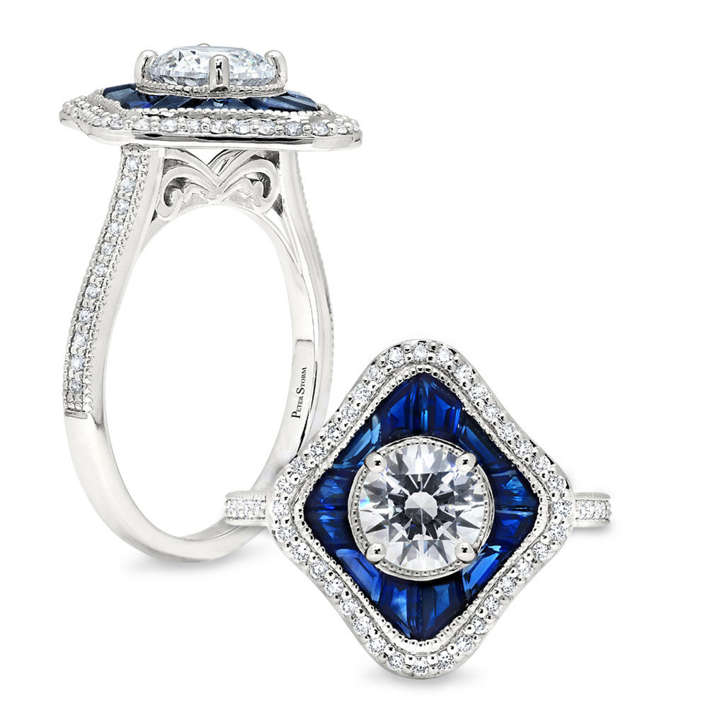 Top and side view of a vintage engagement ring with blue sapphire accents, a diamond halo, and an 18k white gold band.