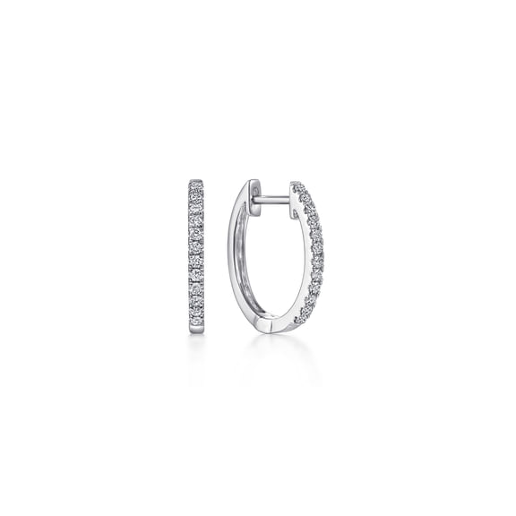Gabriel & Co white gold diamond huggie earrings with diamond-lined fronts, larger center diamond stations and hinged closures.