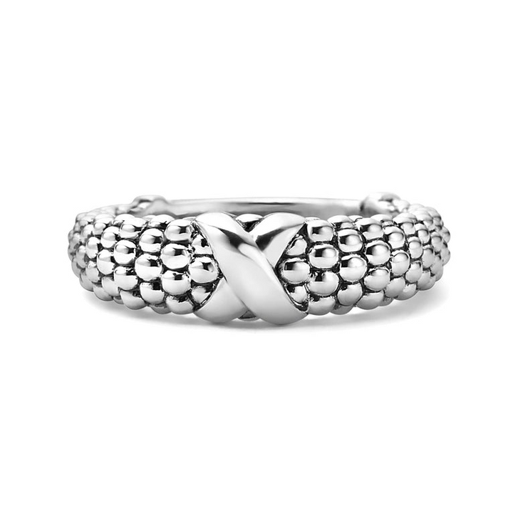 A front view of a sterling silver ring against a white background. The ring features an X-shaped design and classic caviar beading.