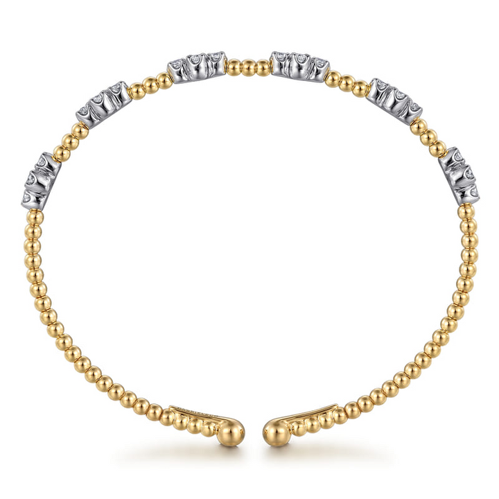 Rear view of the Gabriel & Co Bujukan open bangle showing the white gold galleries beneath its diamond-set tips.